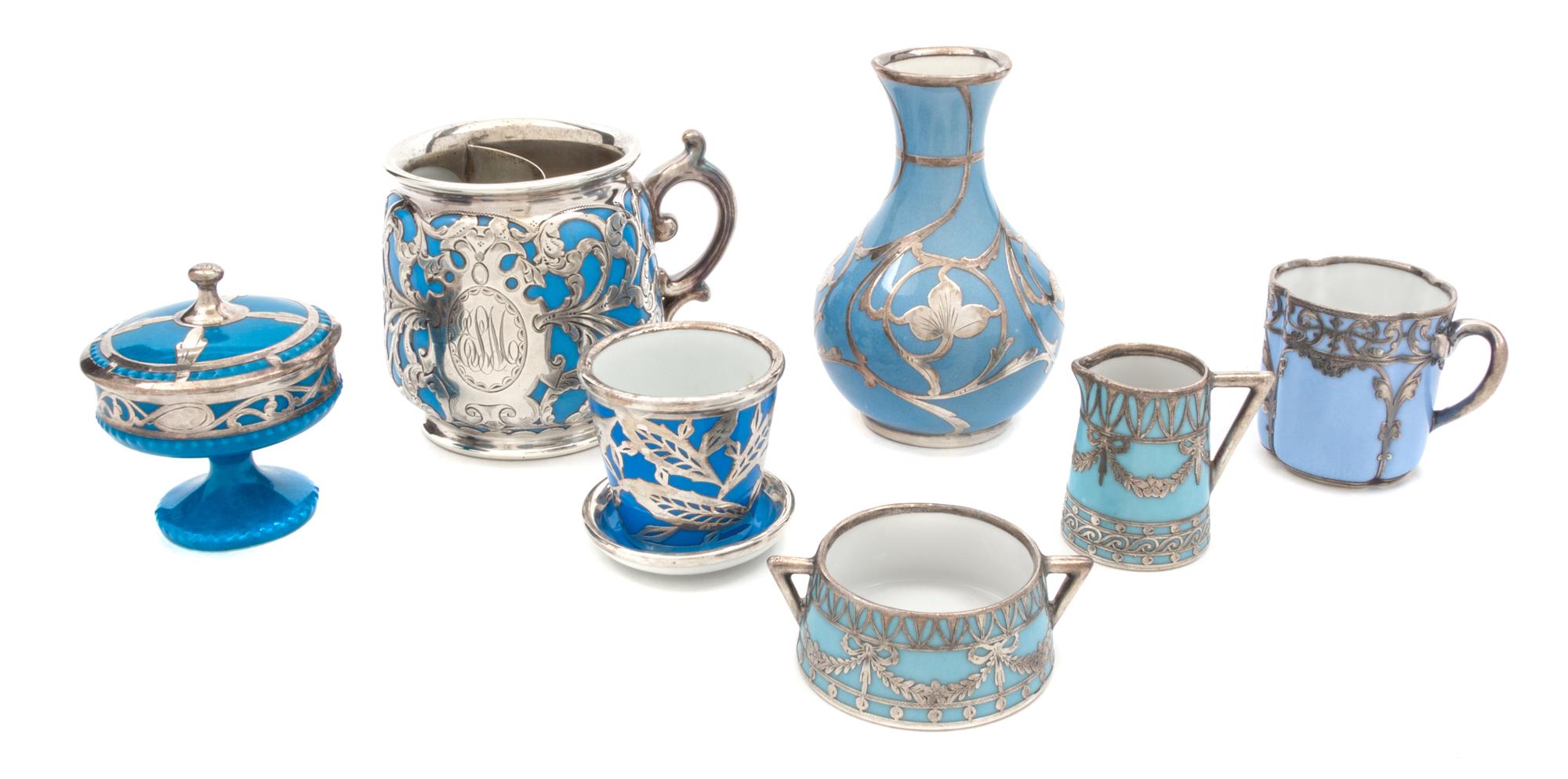 A Group of Porcelain Silver Overlay Articles Height of first 4 1/2 inches.