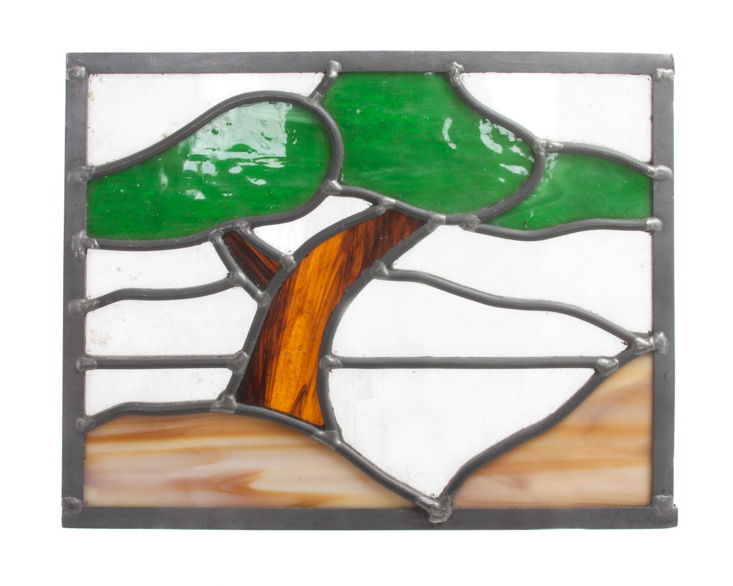 A Collection of Twelve Leaded Glass Windows Largest: 17 1/2 x 39 1/2 inches.