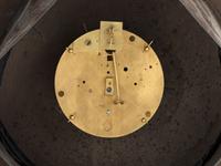 A French Painted and Parcel Gilt Tin Shop Wall Clock
