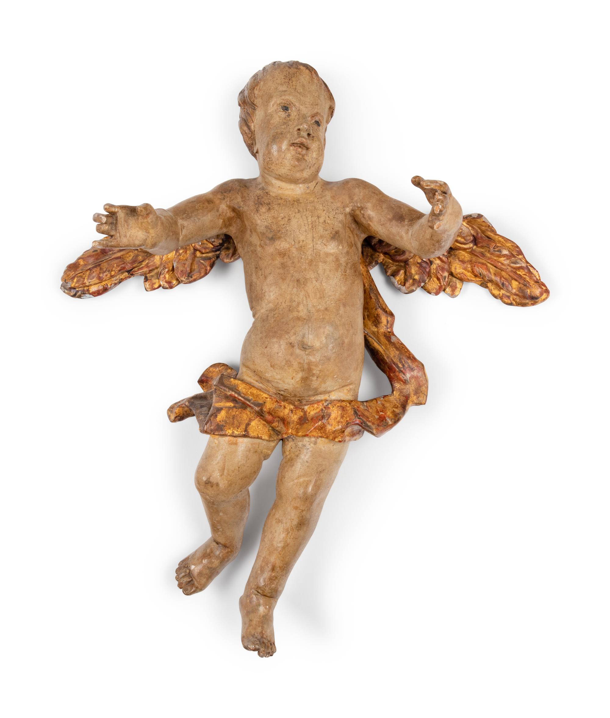An Italian Painted and Parcel Gilt Figure of a Cherub