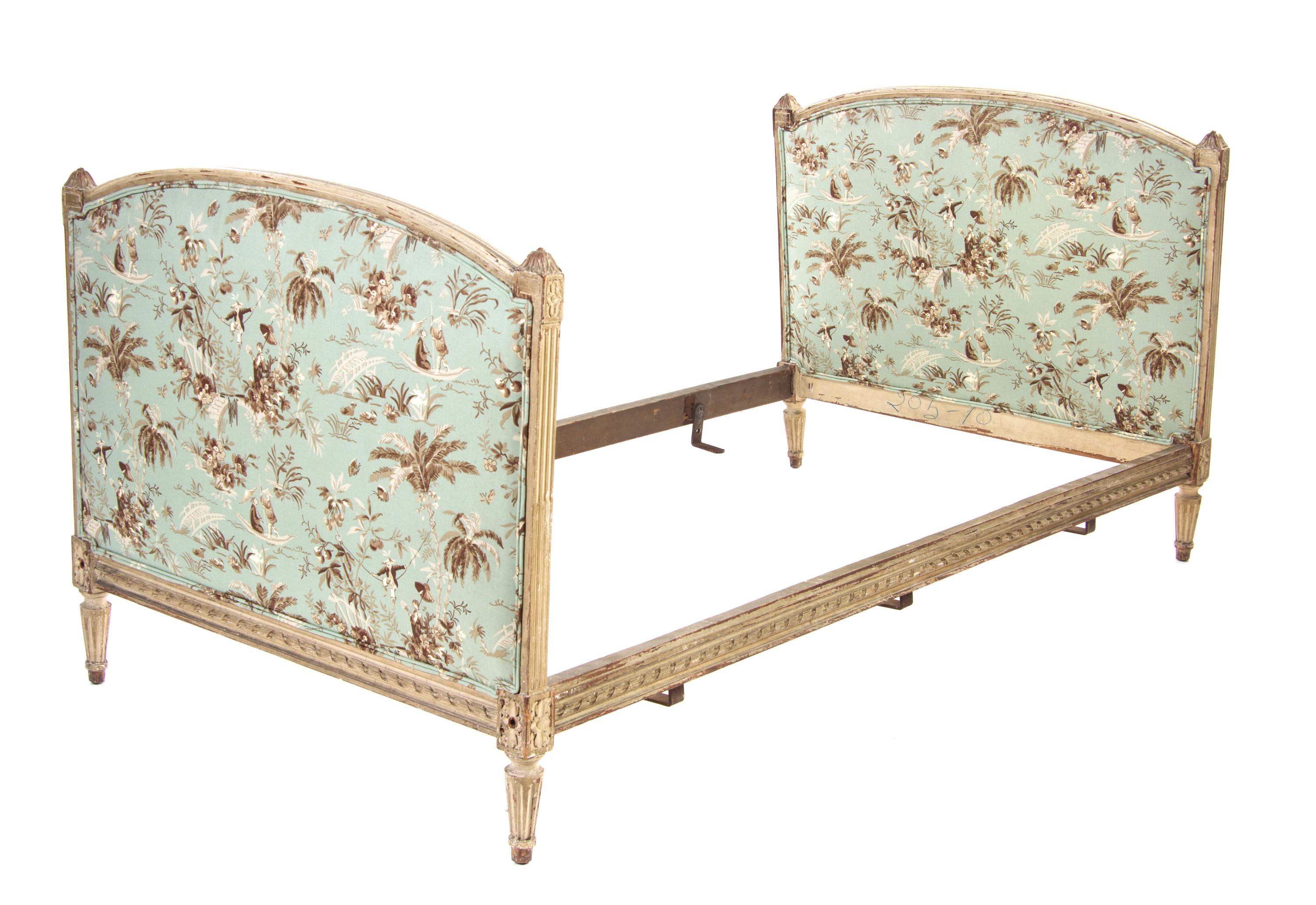 A Louis XVI Style Painted and Upholstered Daybed, Height 37 x width 43 1/2 inches.