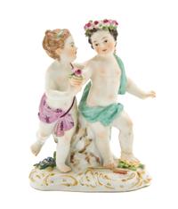 A Meissen Porcelain Figural Group, Height 4 1/2 inches.