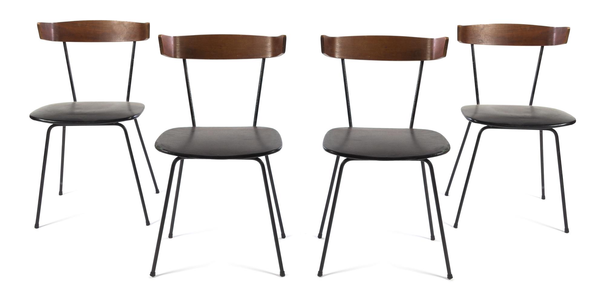 A Set of Four Mid-Century Vinyl Upholstered Chairs. Height 29 1/2 inches.