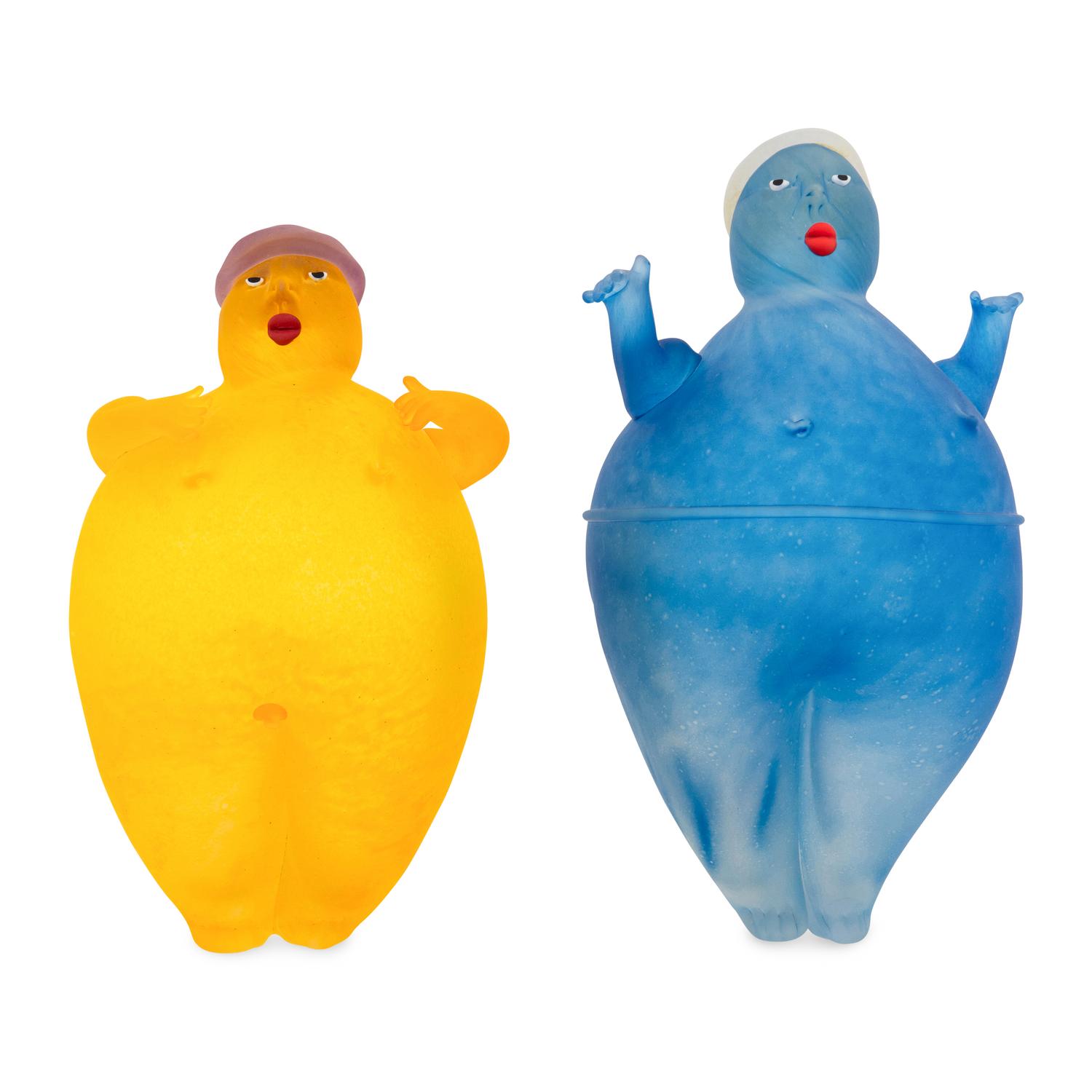 Two sculpted glass puppets