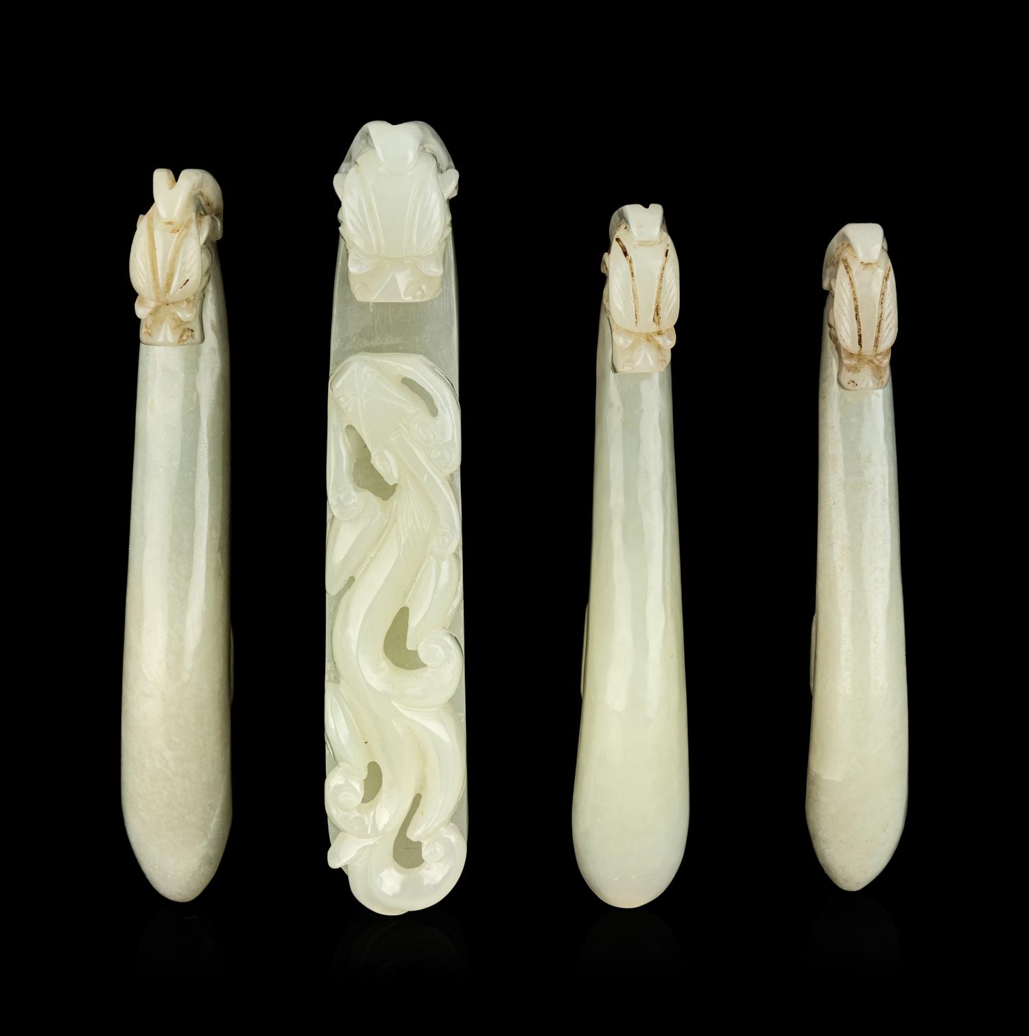 Four Chinese Celadon Jade 'Chilong' Belt Hooks