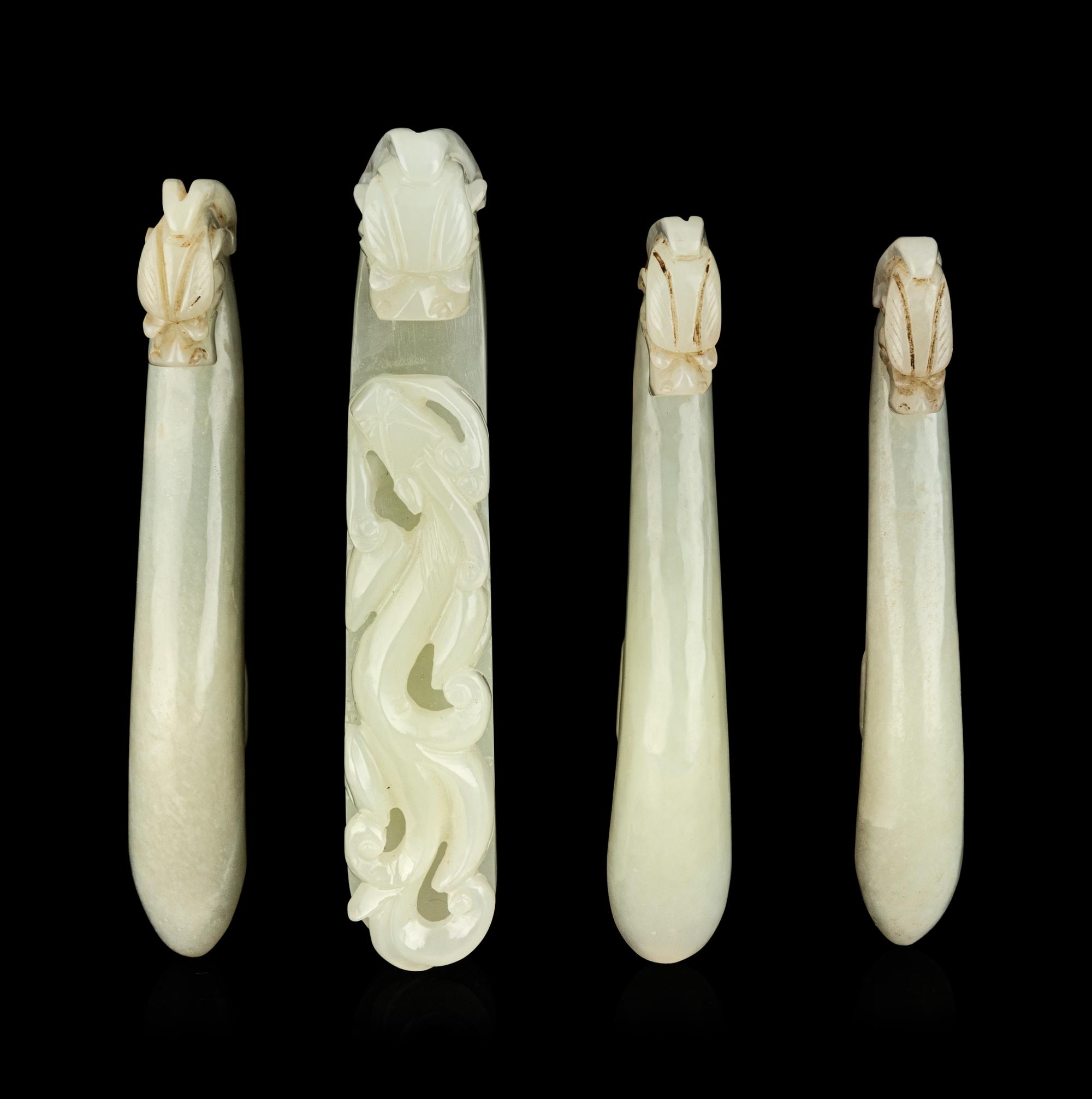 Four Chinese Celadon Jade 'Chilong' Belt Hooks