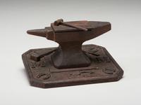 A Folk Art Carved and Stained Wood Anvil and Hammer Form Box