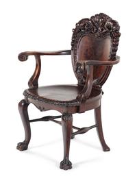 A Baroque Revival Carved Mahogany Armchair