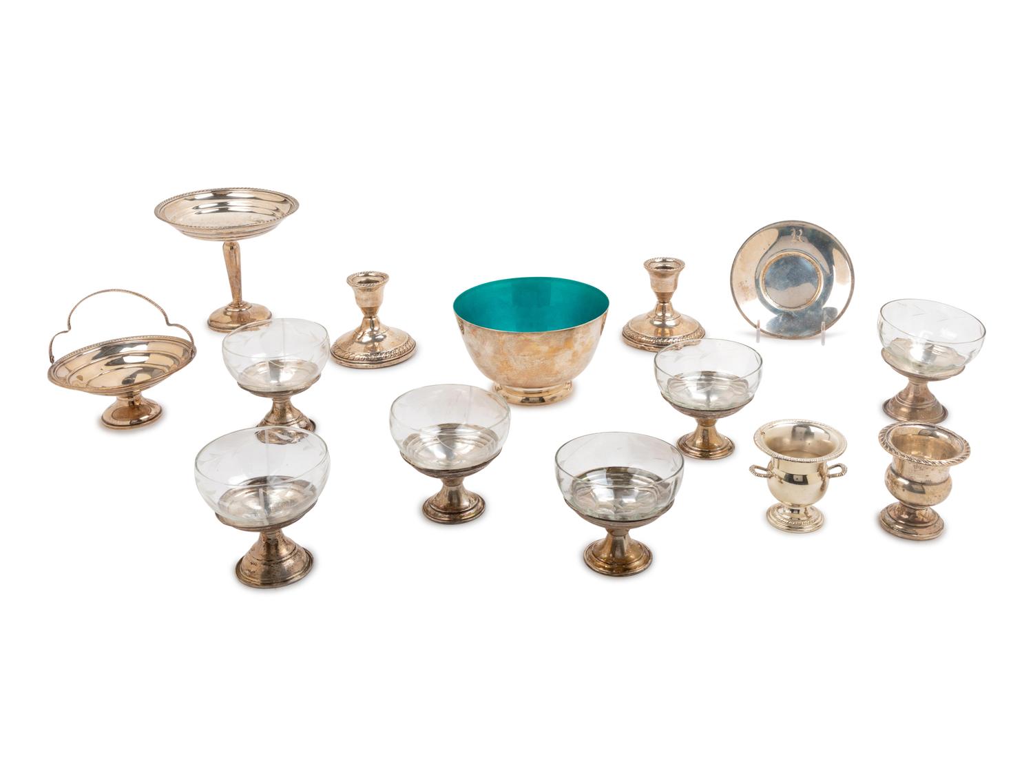 A Group of Fourteen Silver and Silvered Metal Table Articles