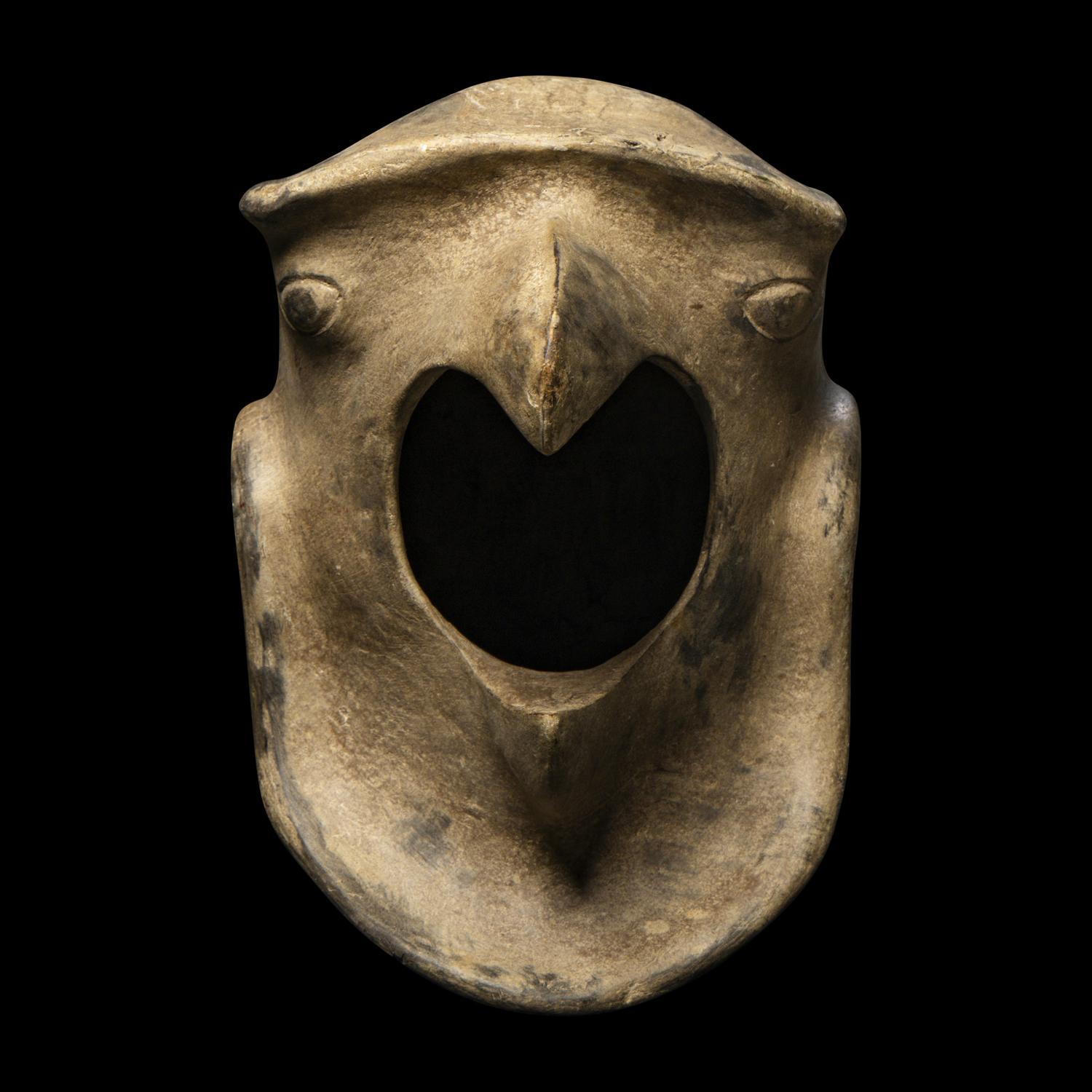 An Aztec Carved Wood Helmet of the Eagle Warrior