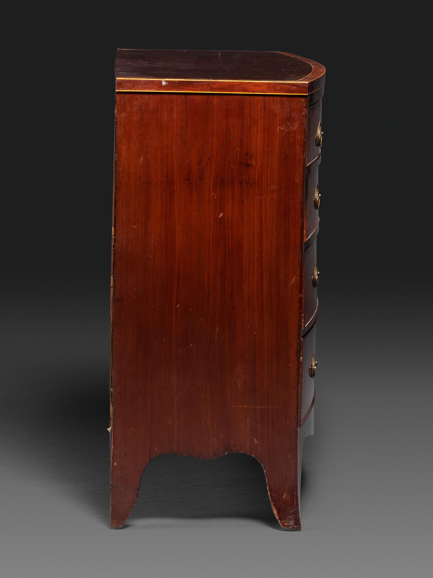 A Federal Figured and Banded Mahogany Bowfront Chest of Drawers