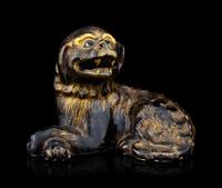 A Chinese Export Gilt Decorated Black Glazed Porcelain Figure of Fu Lion