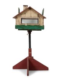 A Carved and Painted Wood Directional Tree and House Bird Feeder