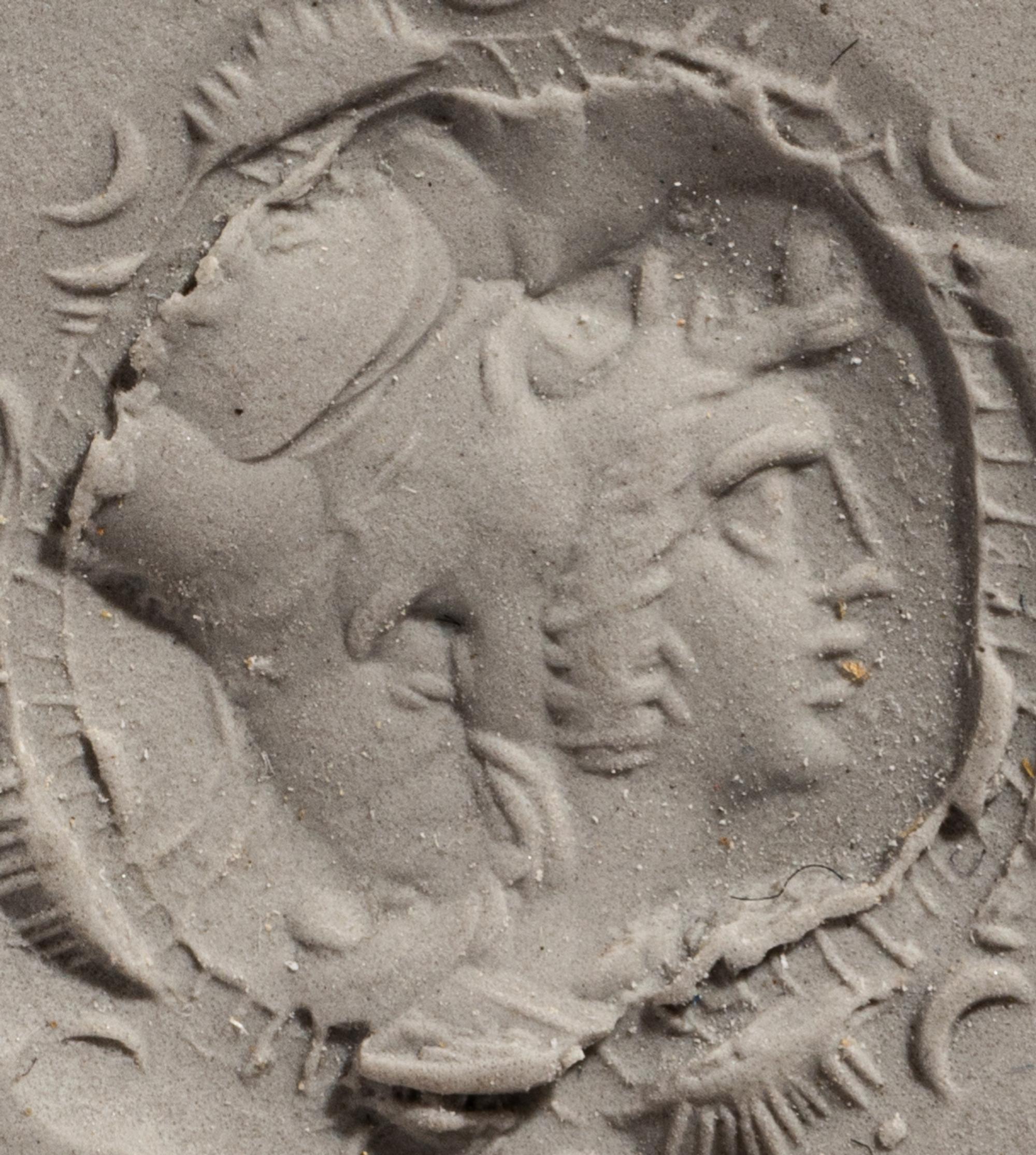 A Roman Carnelian Ring Stone with a Gryllos — Set in a gold ring