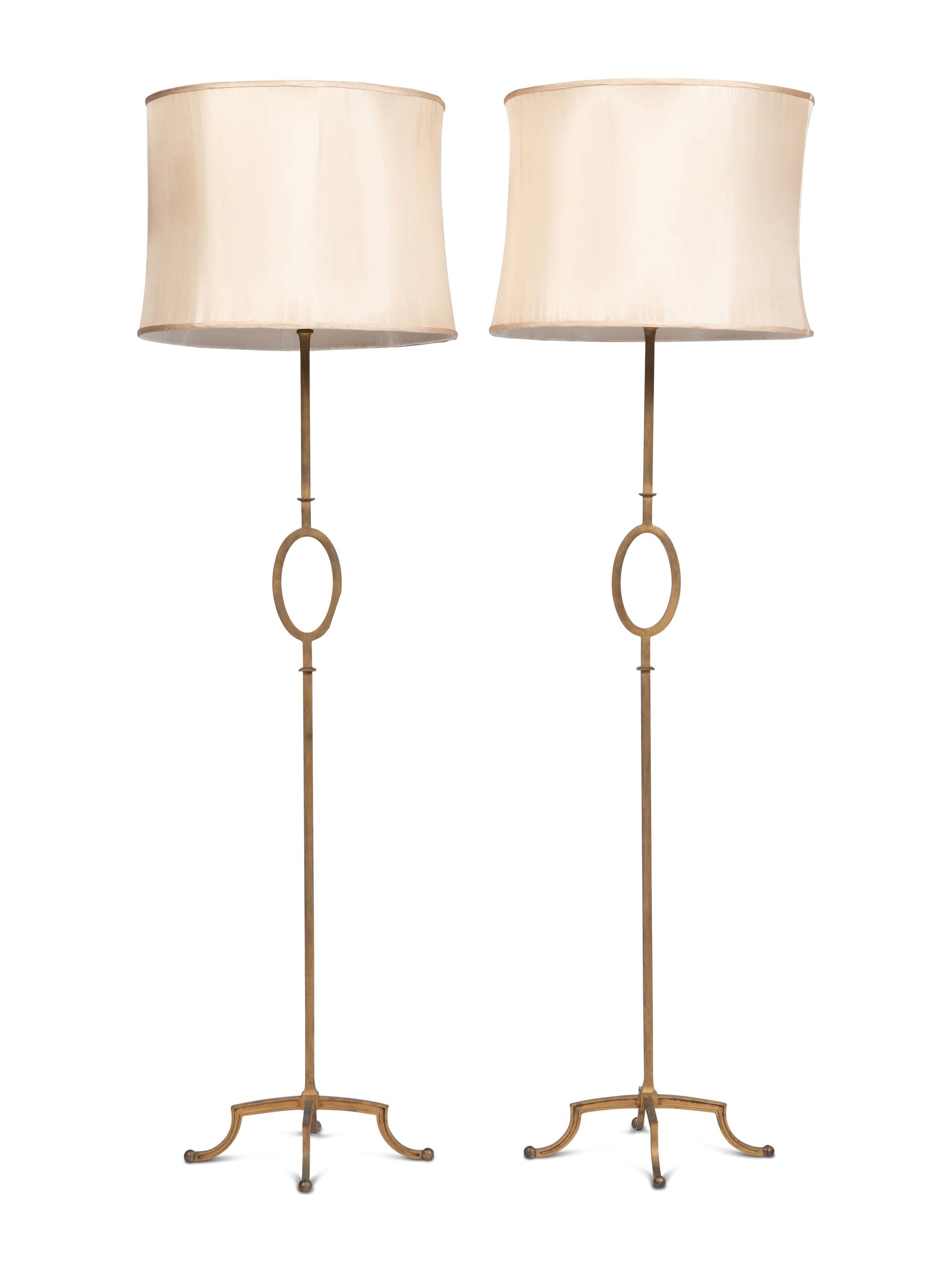 A Pair of Gilt Metal Standing Lamps