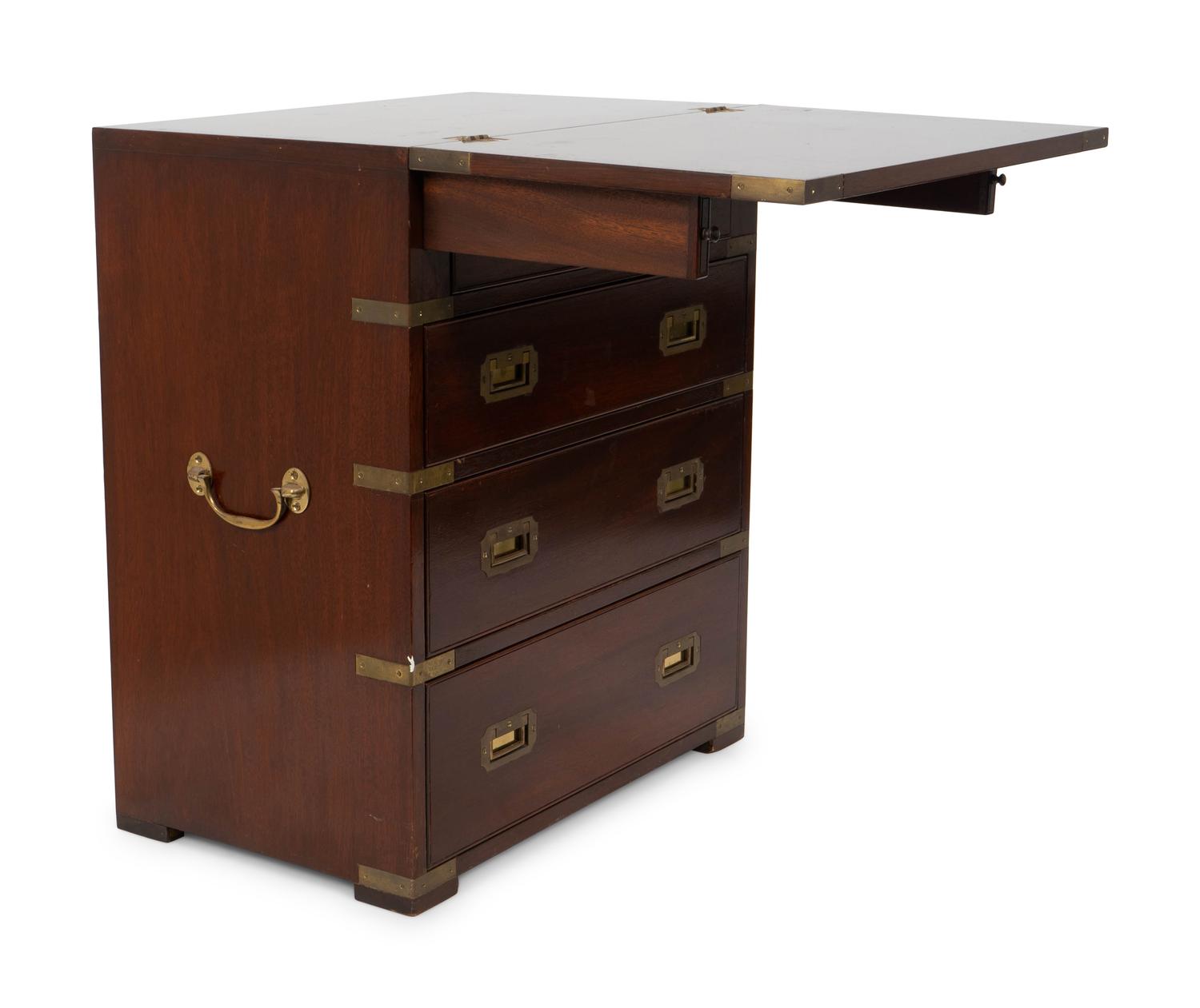 A Diminutive English Campaign Style Brass Mounted Mahogany Chest of Drawers — 20TH CENTURY