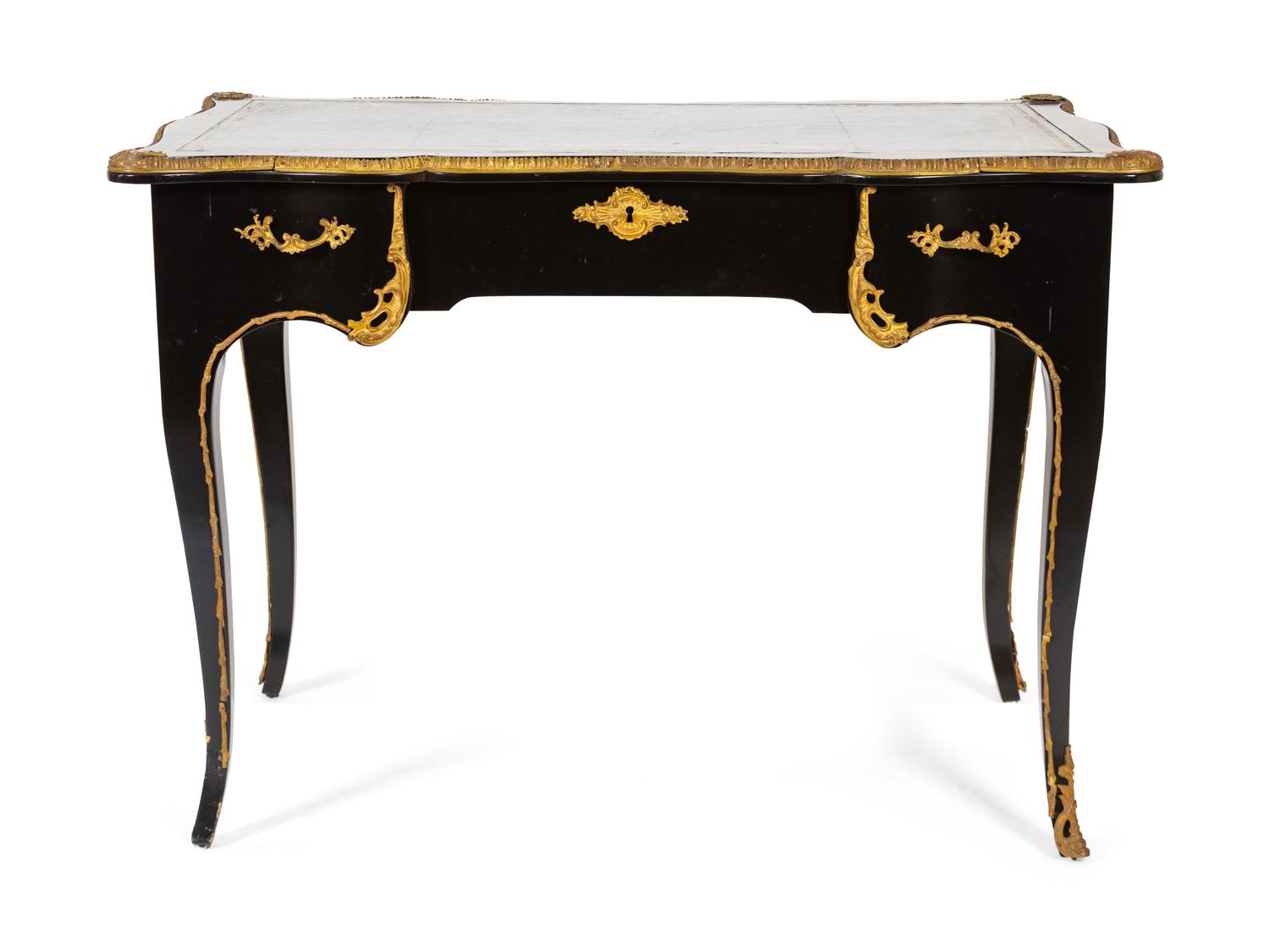 A Louis XV Style Ebonized and Gilt Metal Mounted Bureau Plat — 20TH CENTURY