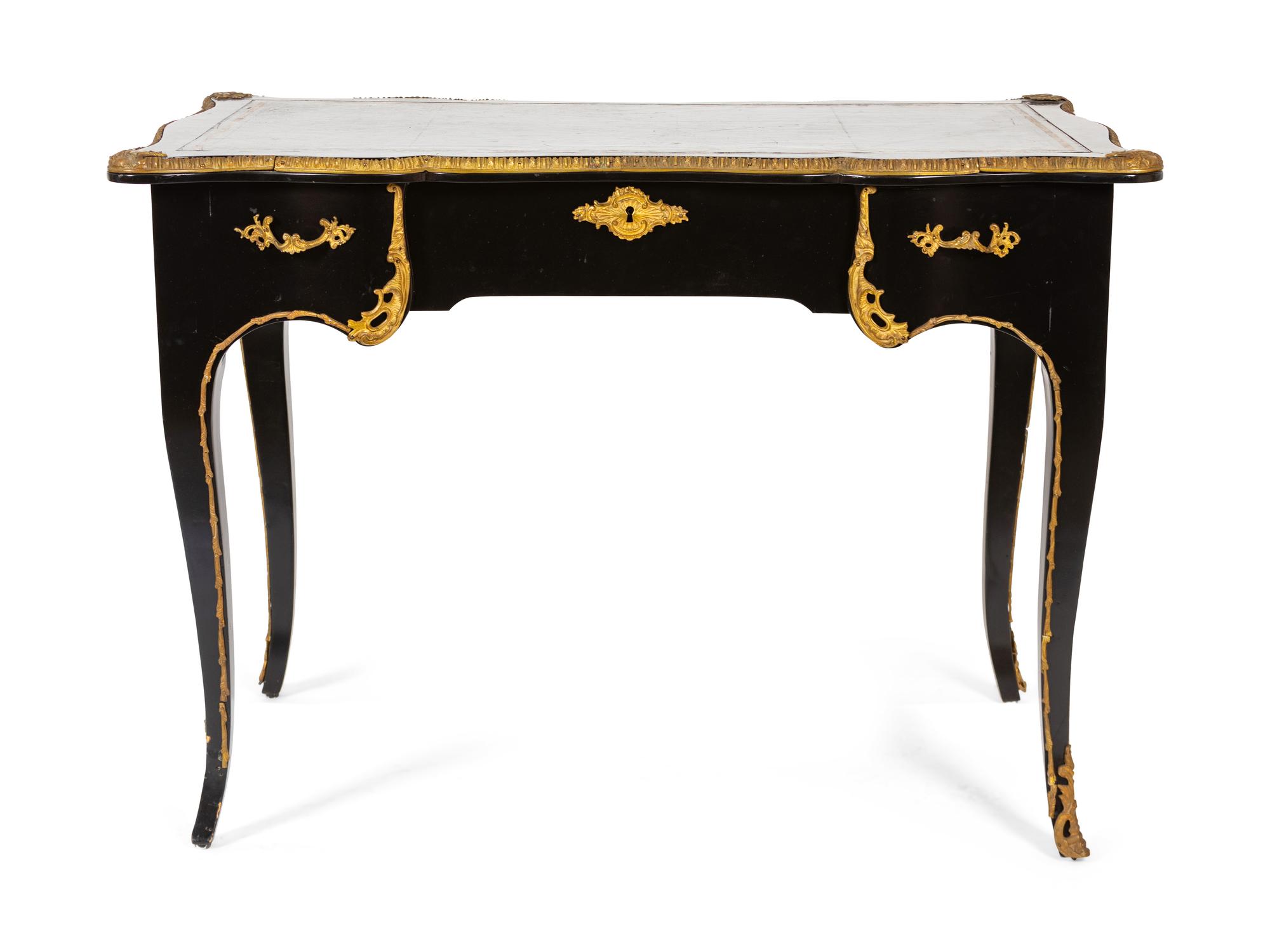 A Louis XV Style Ebonized and Gilt Metal Mounted Bureau Plat — 20TH CENTURY