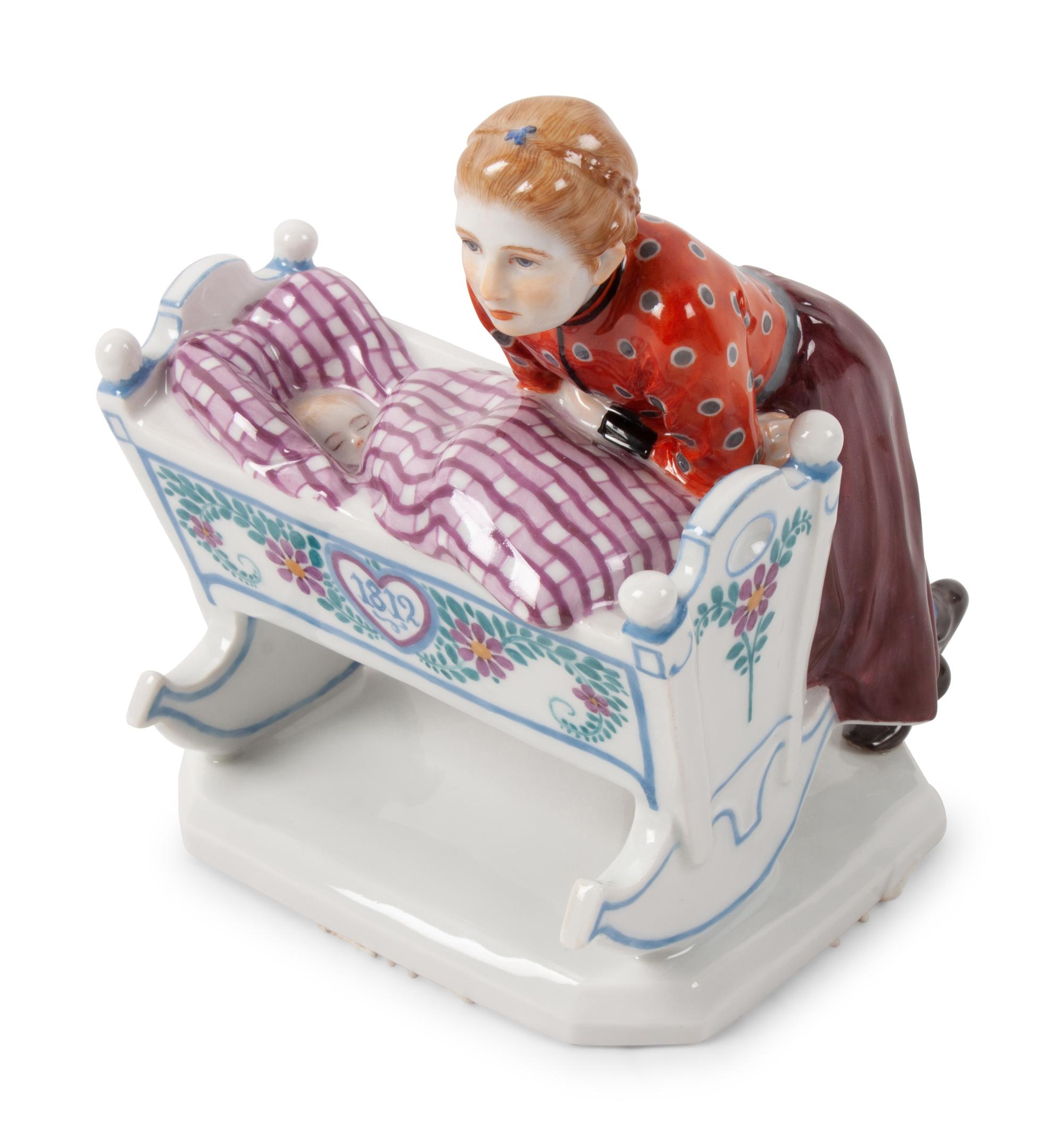 A Meissen Porcelain Figural Group of a Woman with Cradle