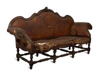 A Spanish Baroque Carved Walnut Leather-Upholstered Sofa — 17TH/18TH CENTURY