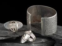 Navajo and Zuni Silver Cuff Bracelet and Rings Set with Sugilite or Chaorite