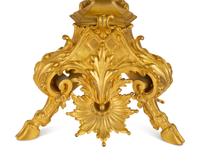 A Pair of Gilt Bronze Figural Seven-Light Candelabra