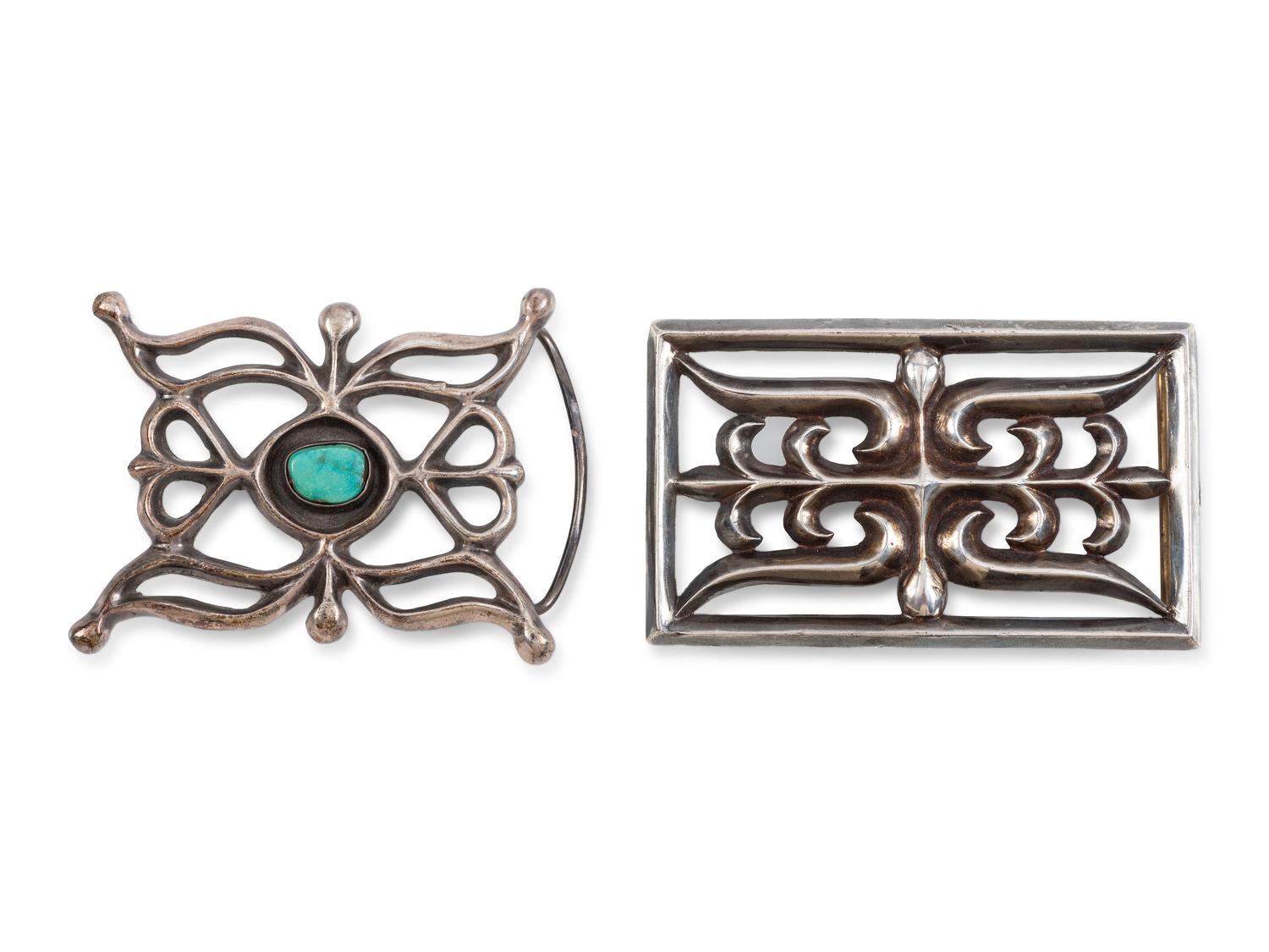 Pair of Navajo Sandcast Silver Belt Buckles