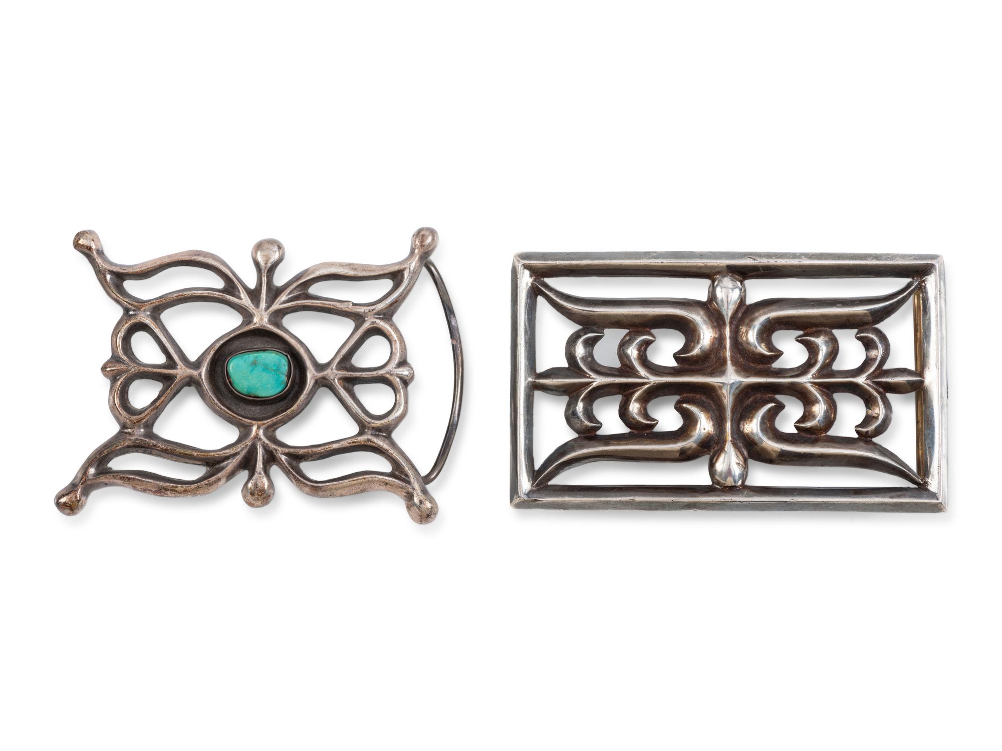 Pair of Navajo Sandcast Silver Belt Buckles