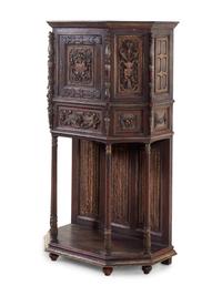 A Gothic Revival Oak Cabinet on Stand