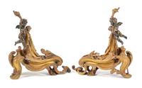 A Pair of Louis XV Style Gilt and Patinated Bronze Chenets Height 17 inches. — 19TH CENTURY