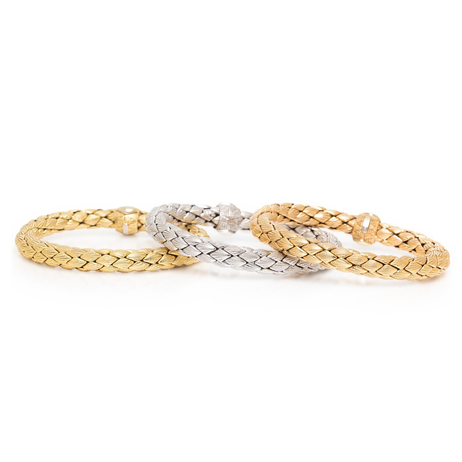 CHIMENTO, THREE CONVERTIBLE TRICOLOR GOLD BRACELETS