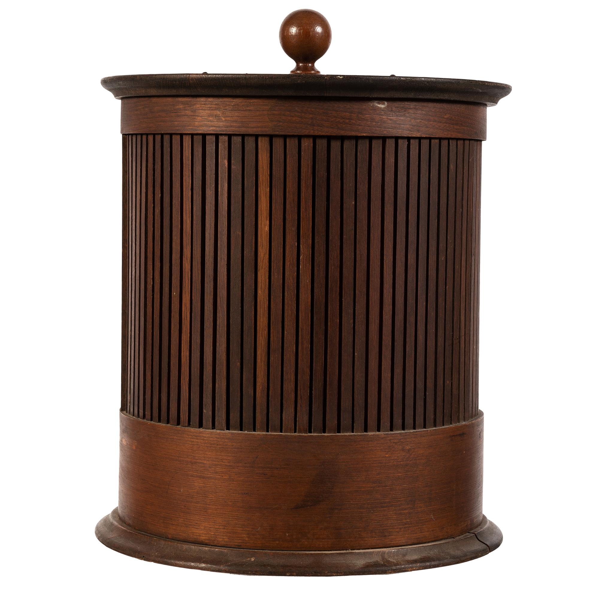 A Merrick's Six Cord Cylindrical Spool Cabinet