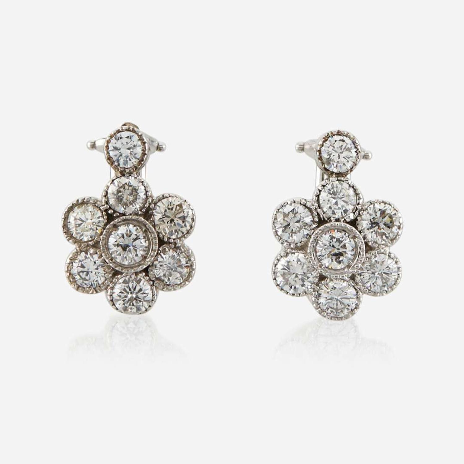 A pair of diamond and white gold earrings