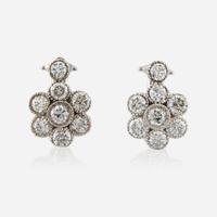 A pair of diamond and white gold earrings