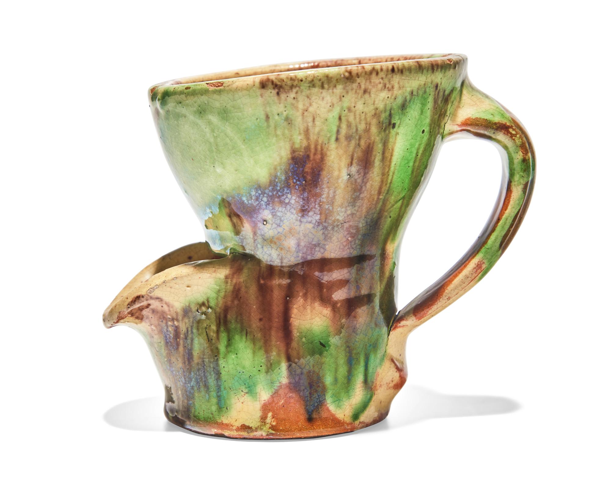 A Shenandoah Valley Multi-Glazed Redware Shaving Mug, Circa 1890