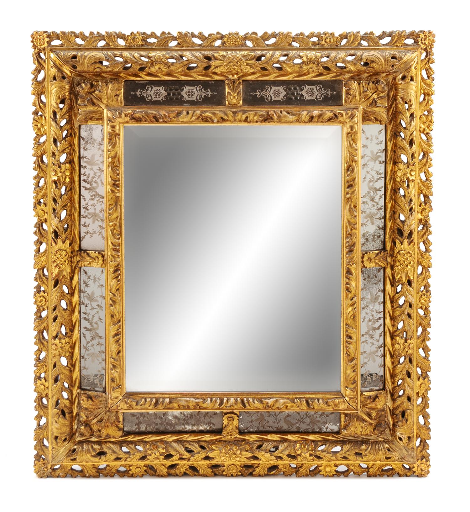 A French Neoclassical Style Giltwood and Etched Glass Mirror