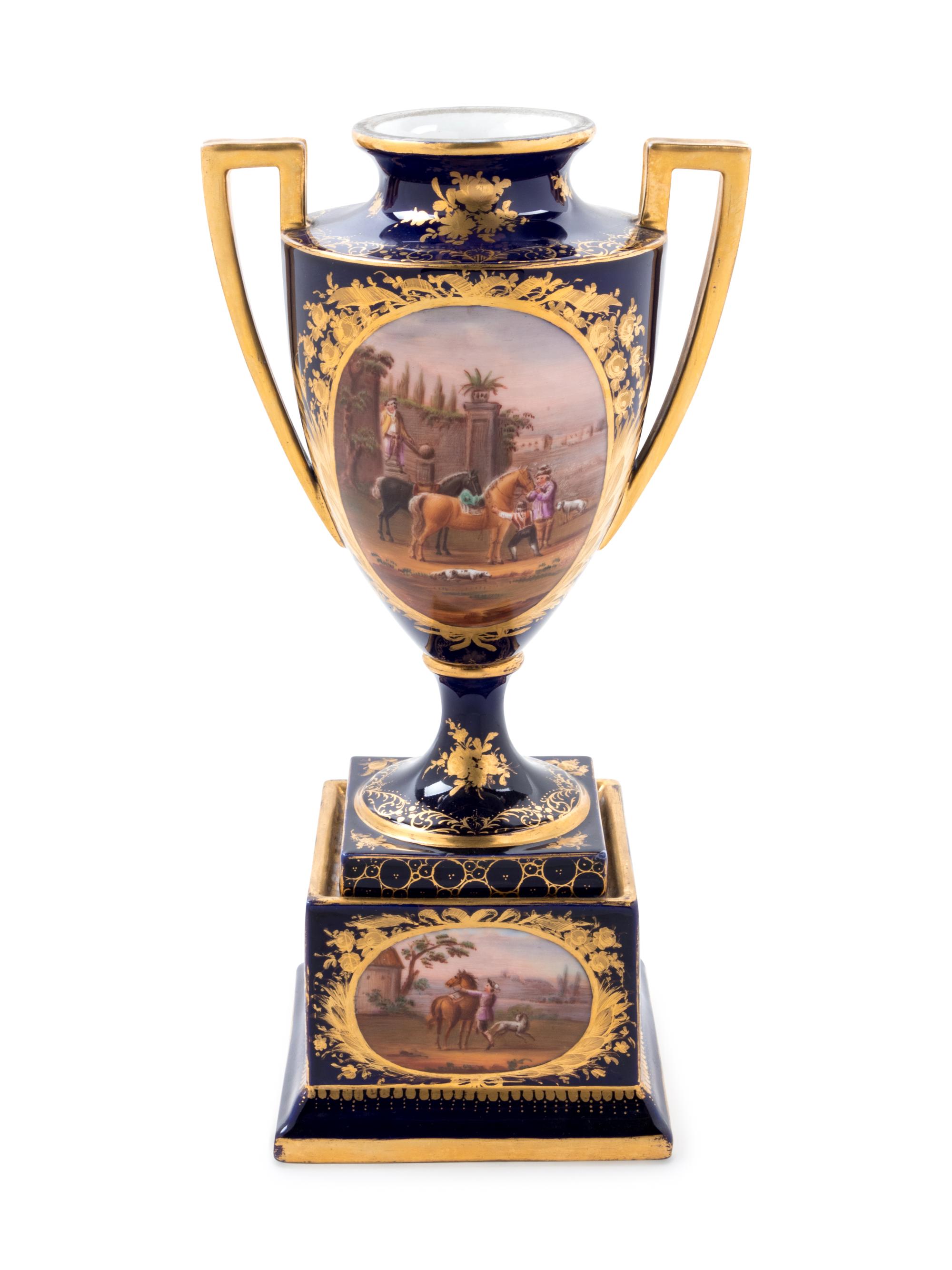 A Sèvres Style Painted and Parcel Gilt Porcelain Urn on Stand