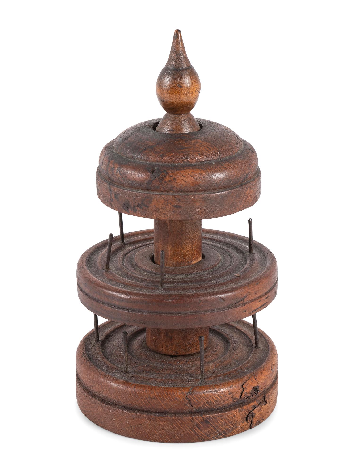 A Turned Cherry Spool Caddy