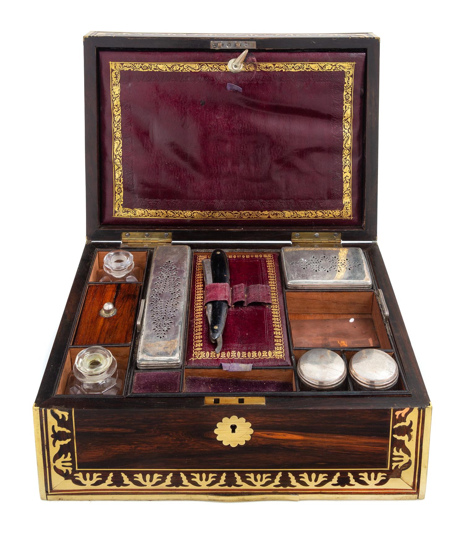A Regency Brass Mounted Calamander Cased Toiletry Set Height 5 1/2 x width 12 3/4 x depth 9 1/4 inches. — FIRST HALF 19TH CENTURY