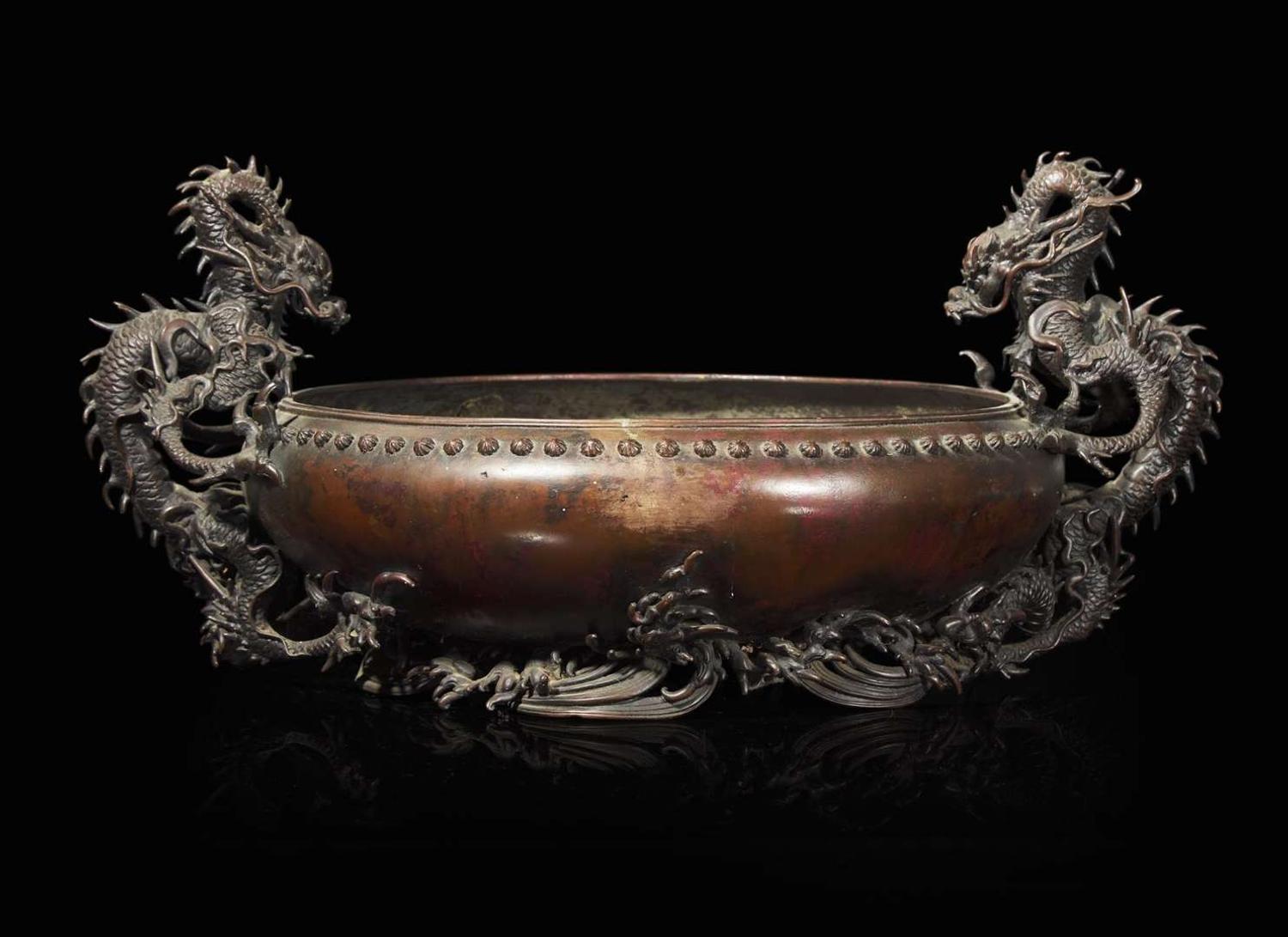 A Japanese patinated bronze "Dragons" jardinière, Meiji period 日本龍紋銅盤 明治