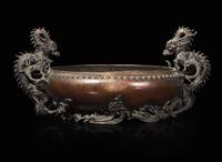 A Japanese patinated bronze "Dragons" jardinière, Meiji period 日本龍紋銅盤 明治