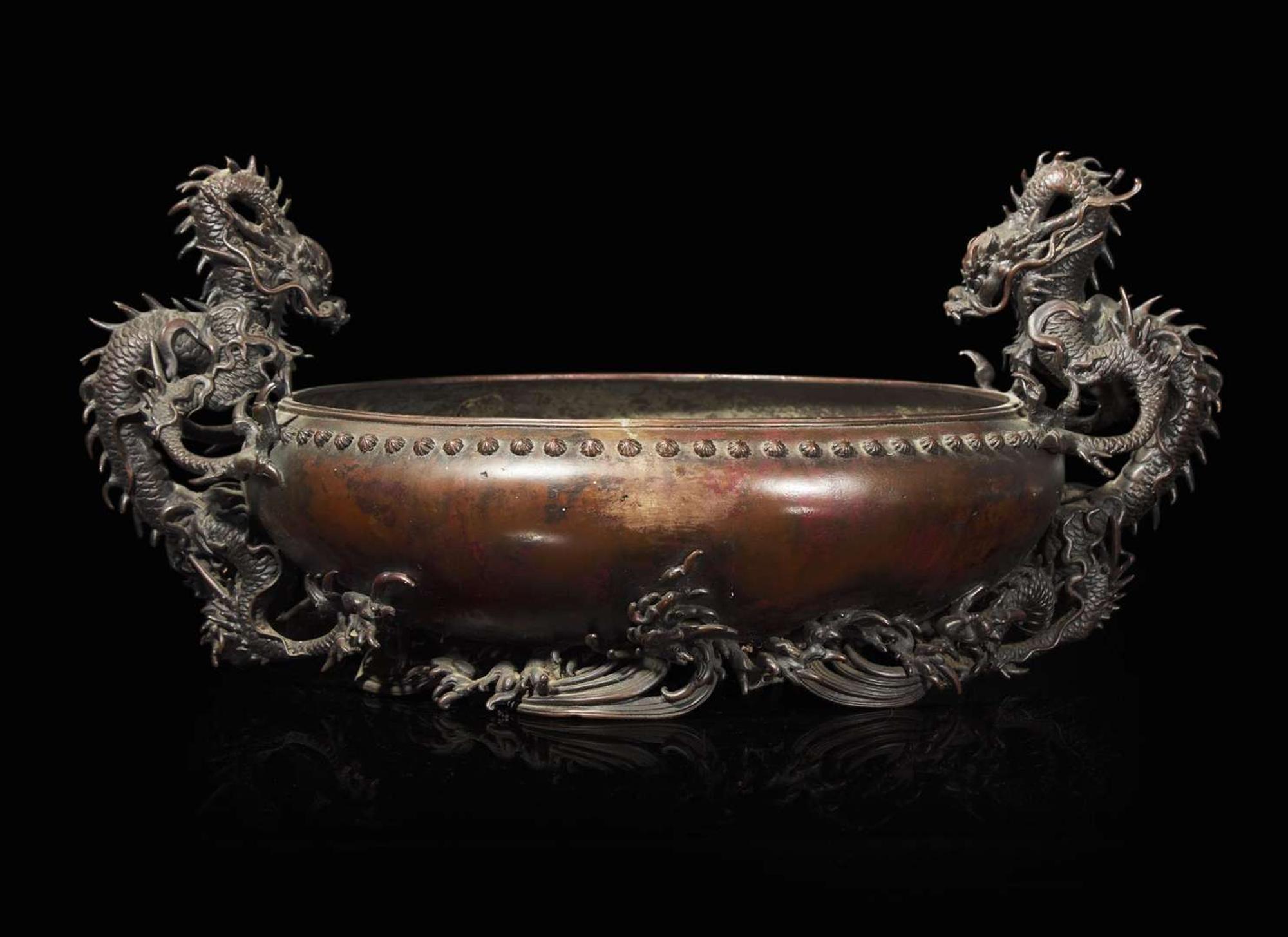 A Japanese patinated bronze "Dragons" jardinière, Meiji period 日本龍紋銅盤 明治