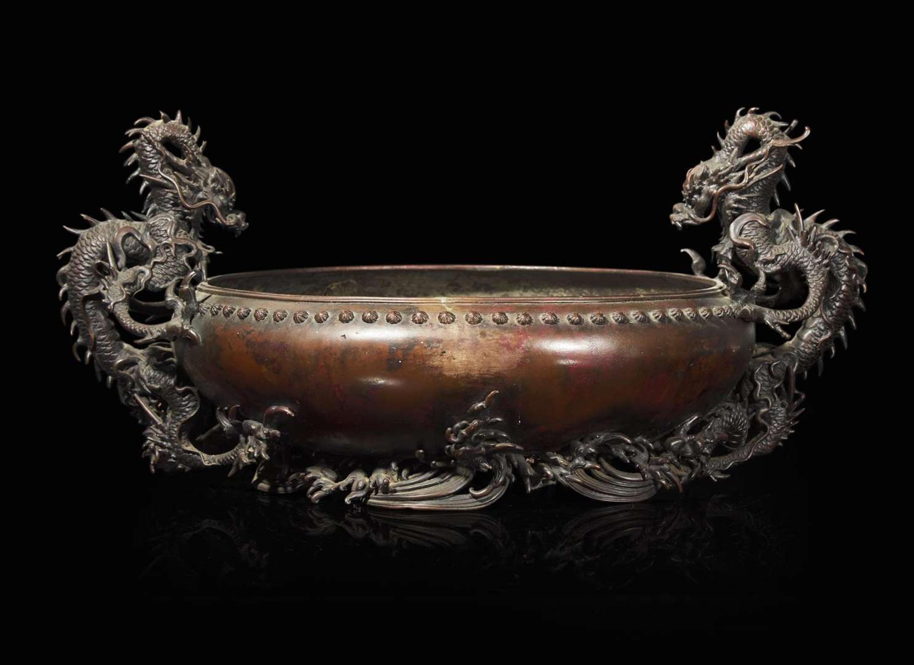 A Japanese patinated bronze "Dragons" jardinière, Meiji period 日本龍紋銅盤 明治