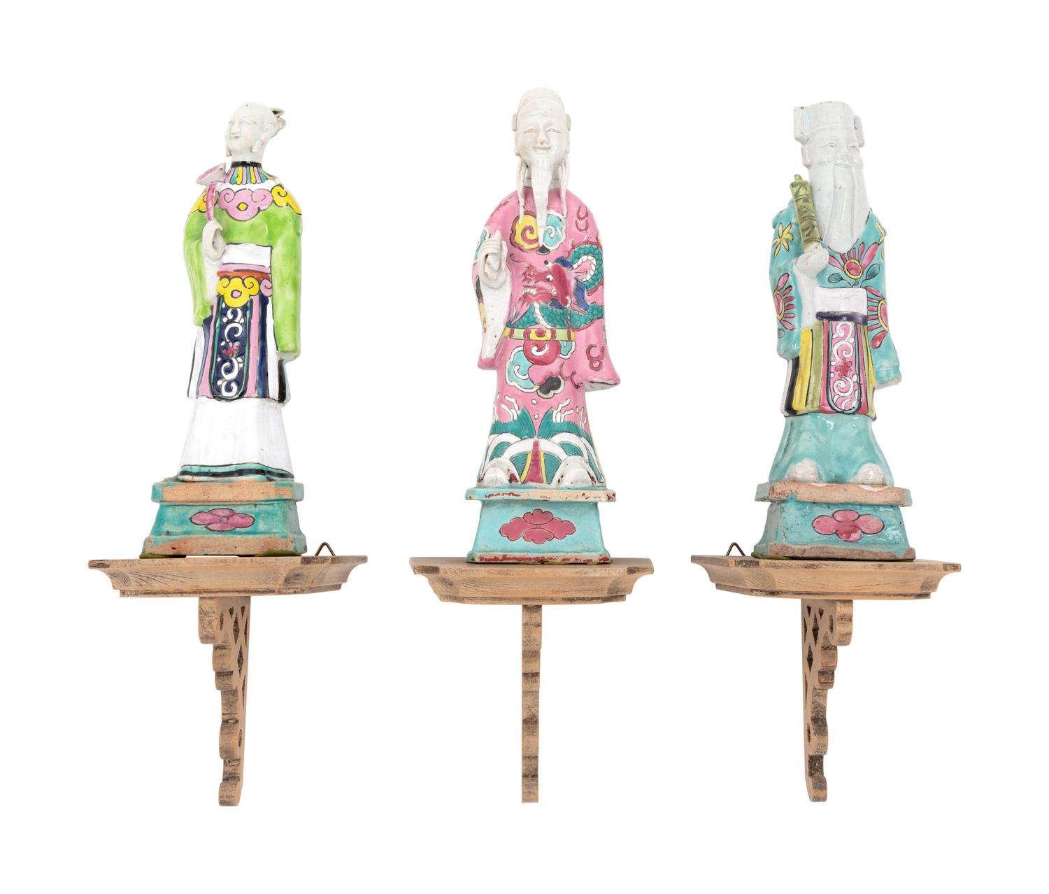 An Assembled Set of Eight Chinese Export Polychrome Porcelain Immortal Figures