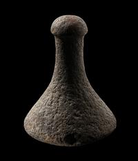 A Tahitian Basalt Poi Pounder