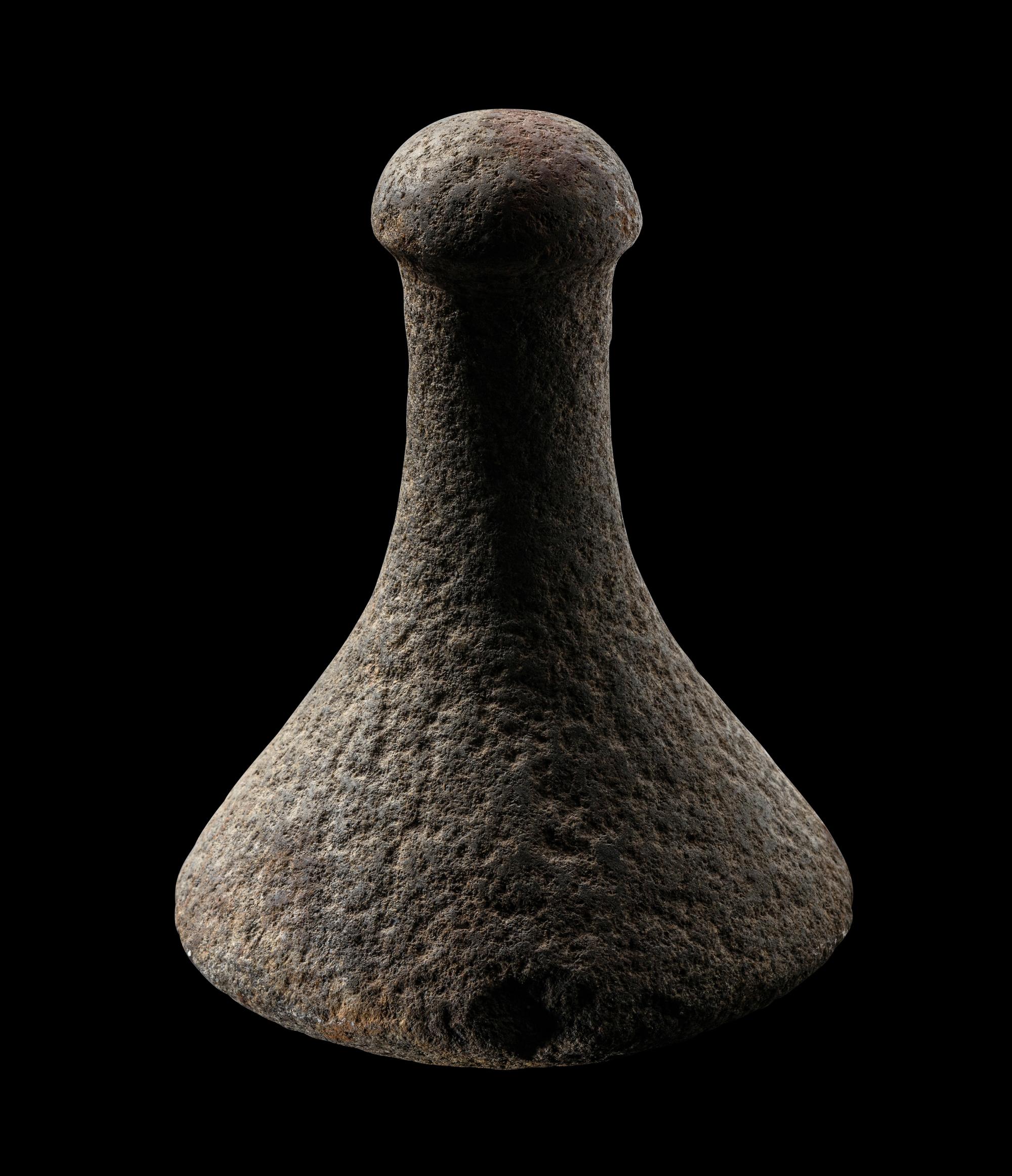 A Tahitian Basalt Poi Pounder