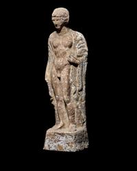 A Boeotian Terracotta Standing Youth with a Cock