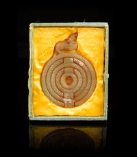 A Group of Seven Carved Jade Bi Discs Diameter of largest 9 inches.