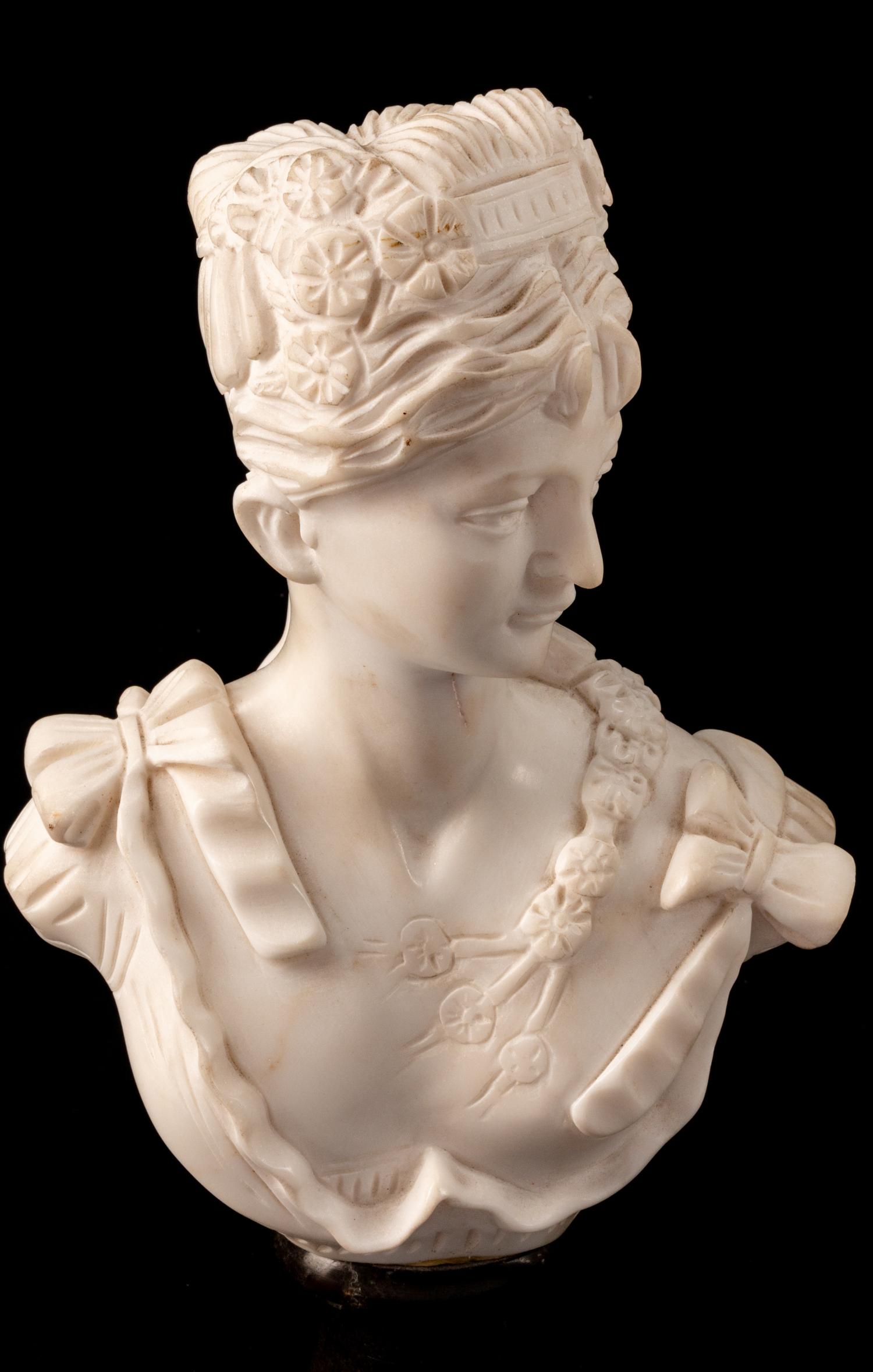 A Set of Four Italian Marble Busts of Women