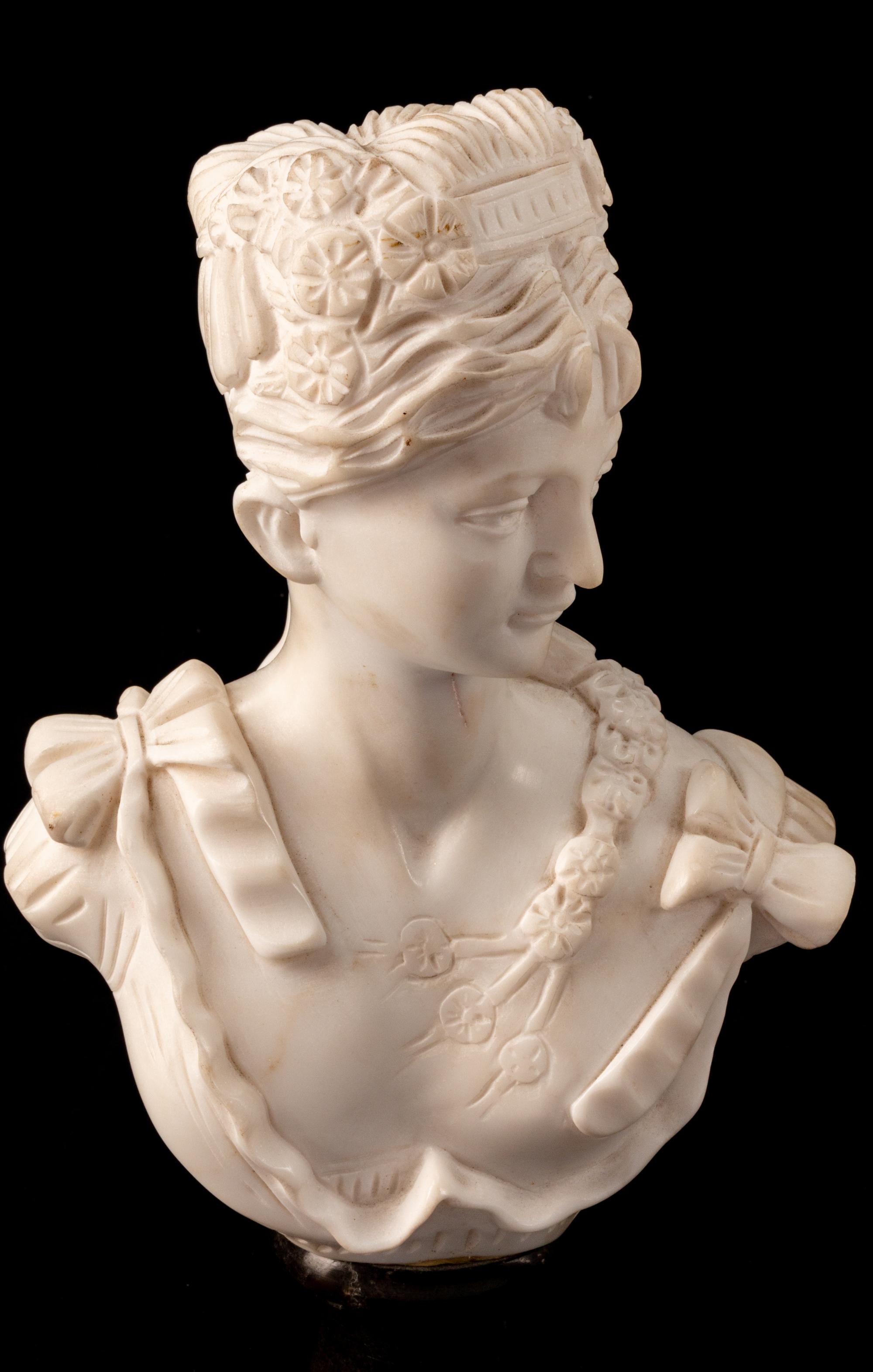 A Set of Four Italian Marble Busts of Women